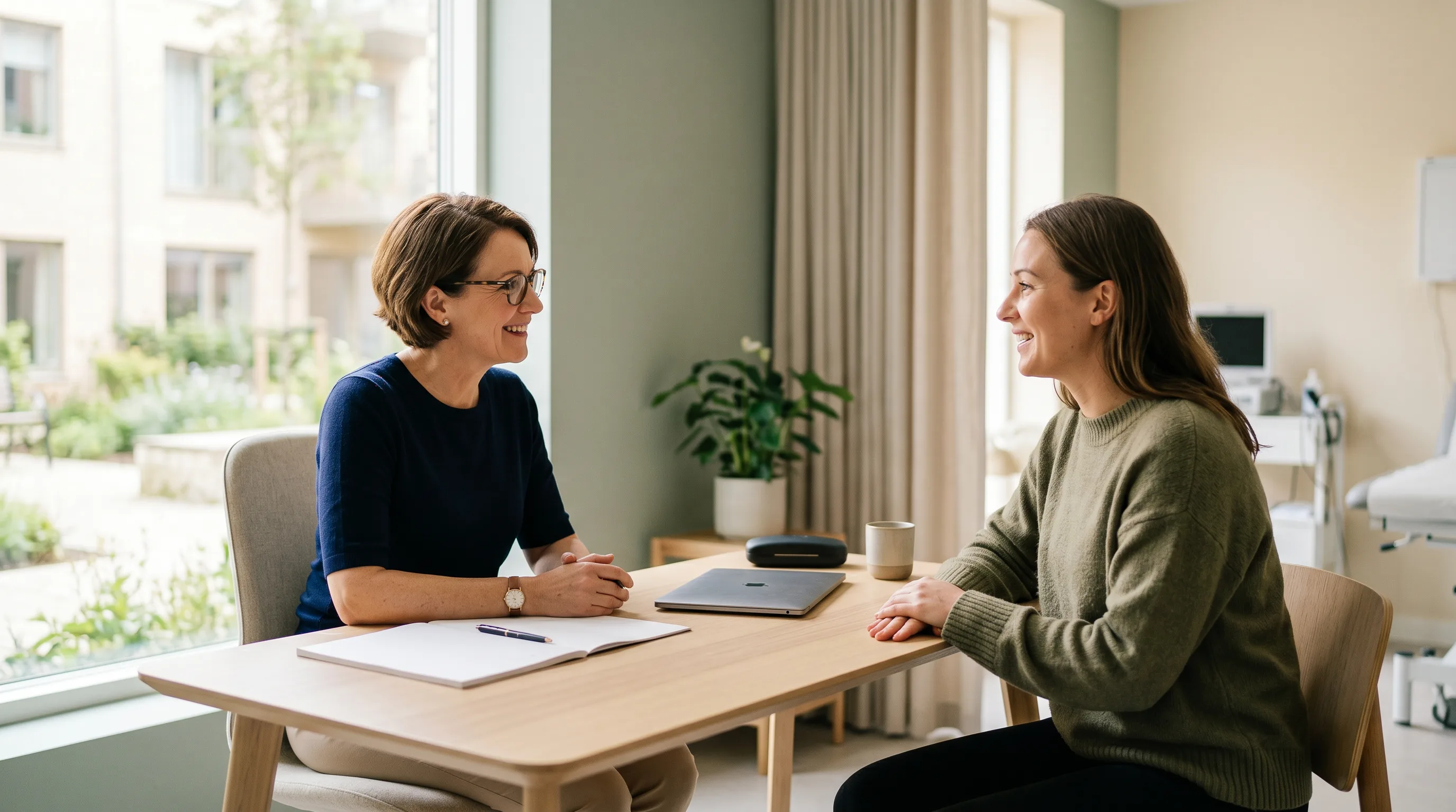 A physician in conversation with a patient in a calm clinic